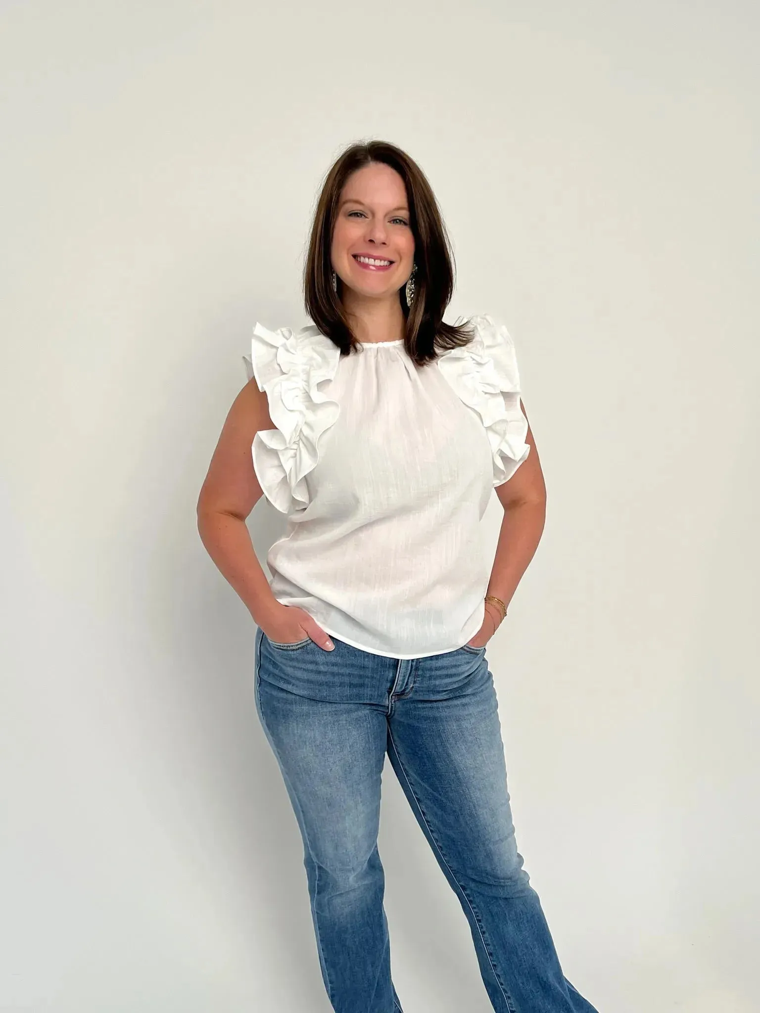 White Sleeveless Ruffle Top